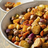 Roasted seasoned root vegetables in bowl