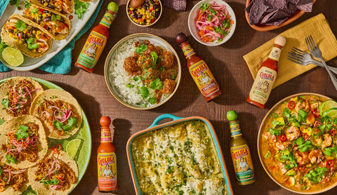 hot sauce with food on table