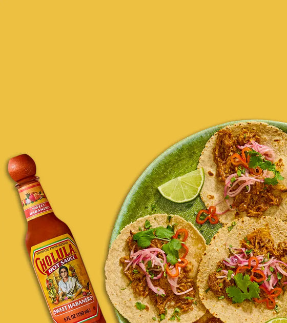 Cholula hot sauce and tacos