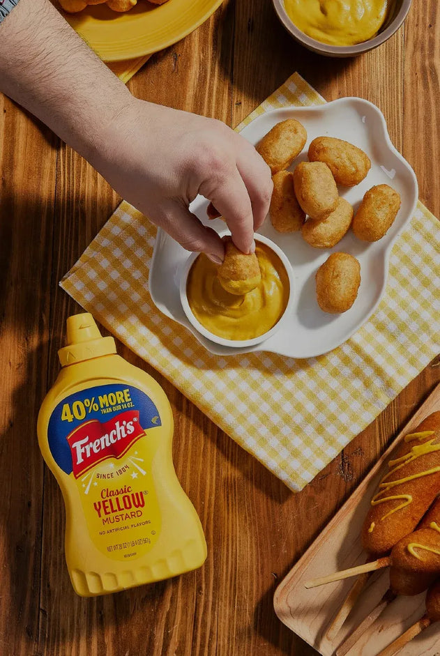 Frenchs mustard with corndogs